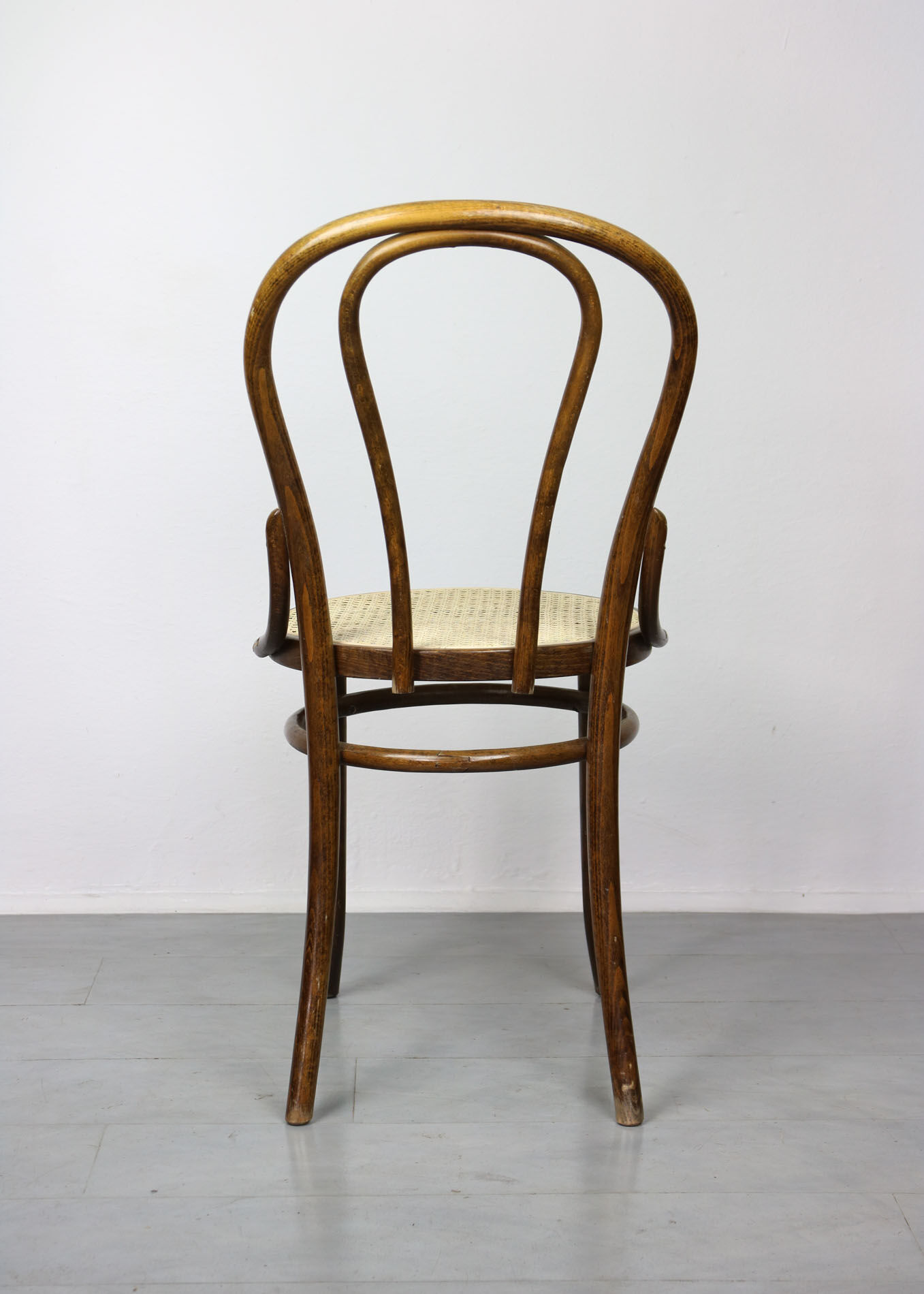Betwood and cane brown chair