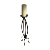 Wrought iron candlestick on feet