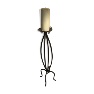 Wrought iron candlestick on feet