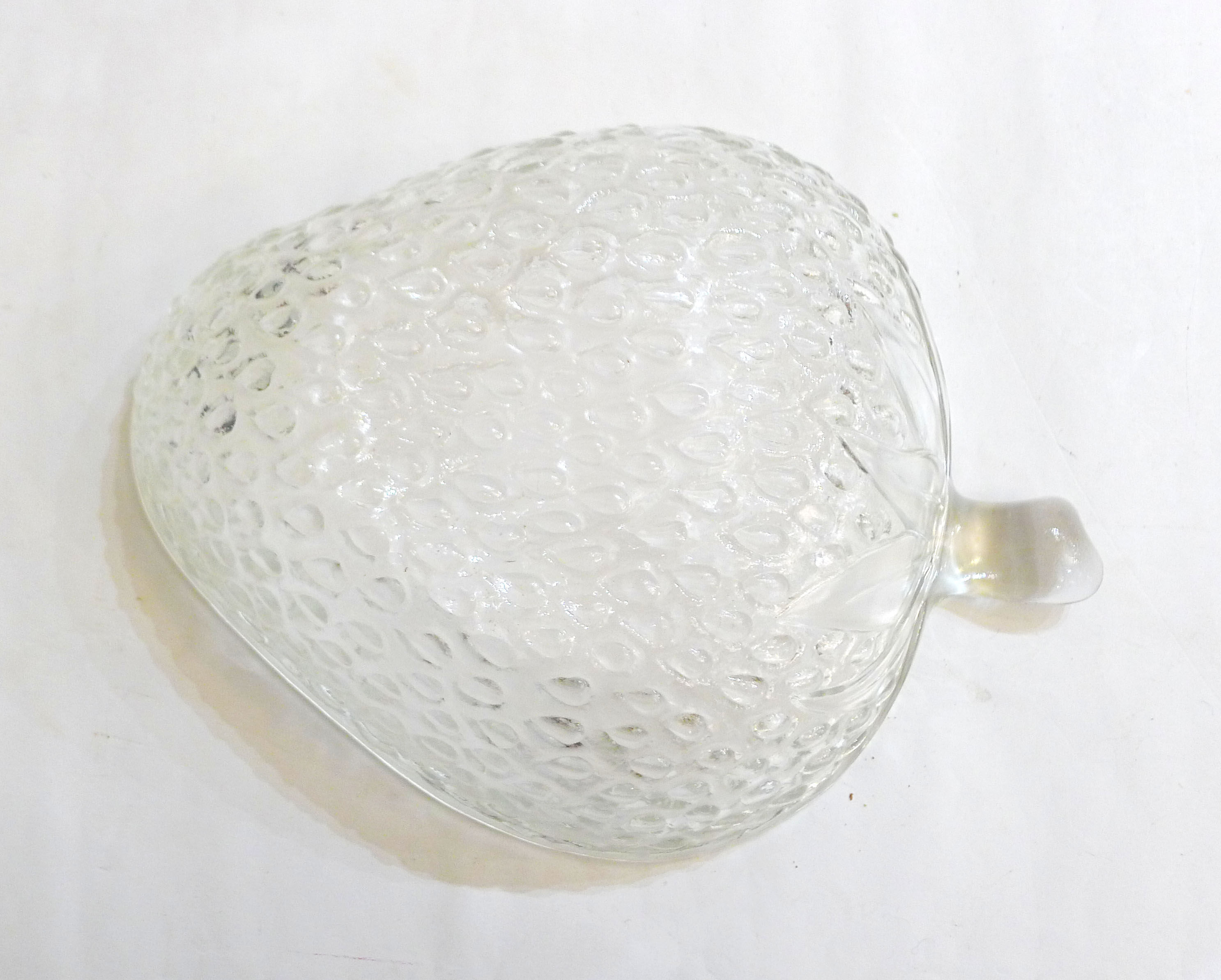 Strawberry salad in colorless glass