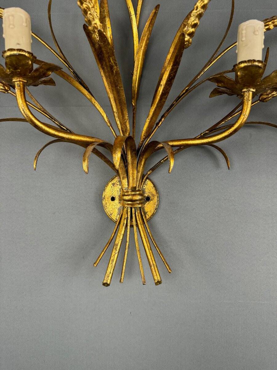 Paire d’appliques en métal doré, XXe Siècle