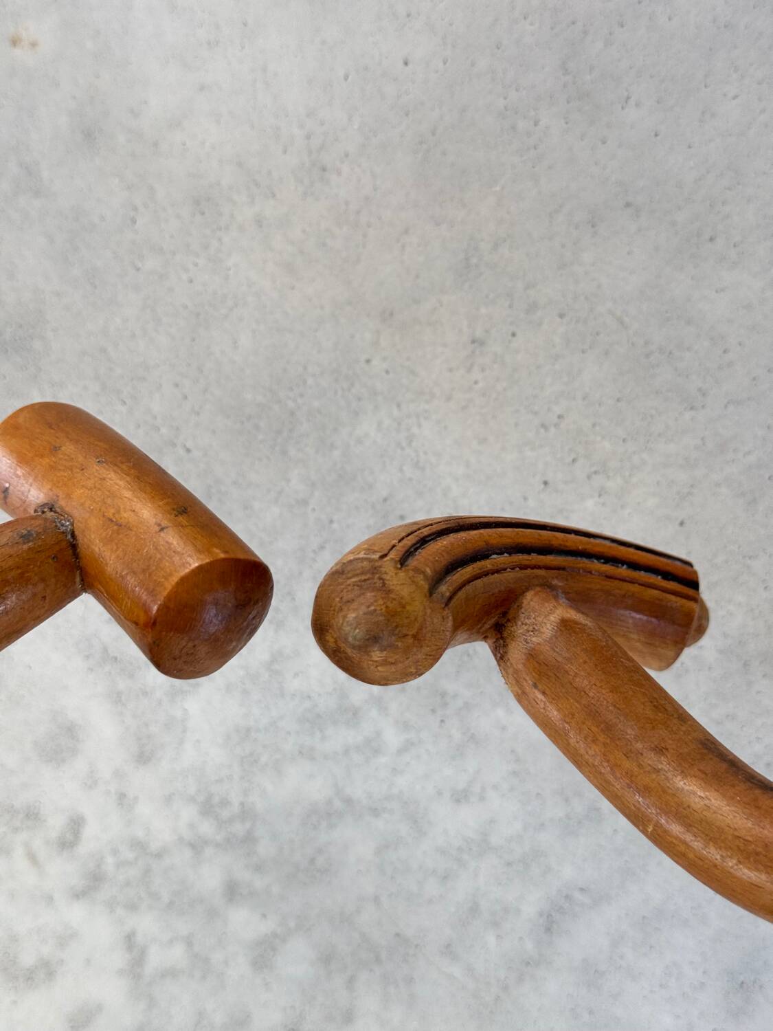 Pair of curved wooden coat racks or hooks from the 1900s