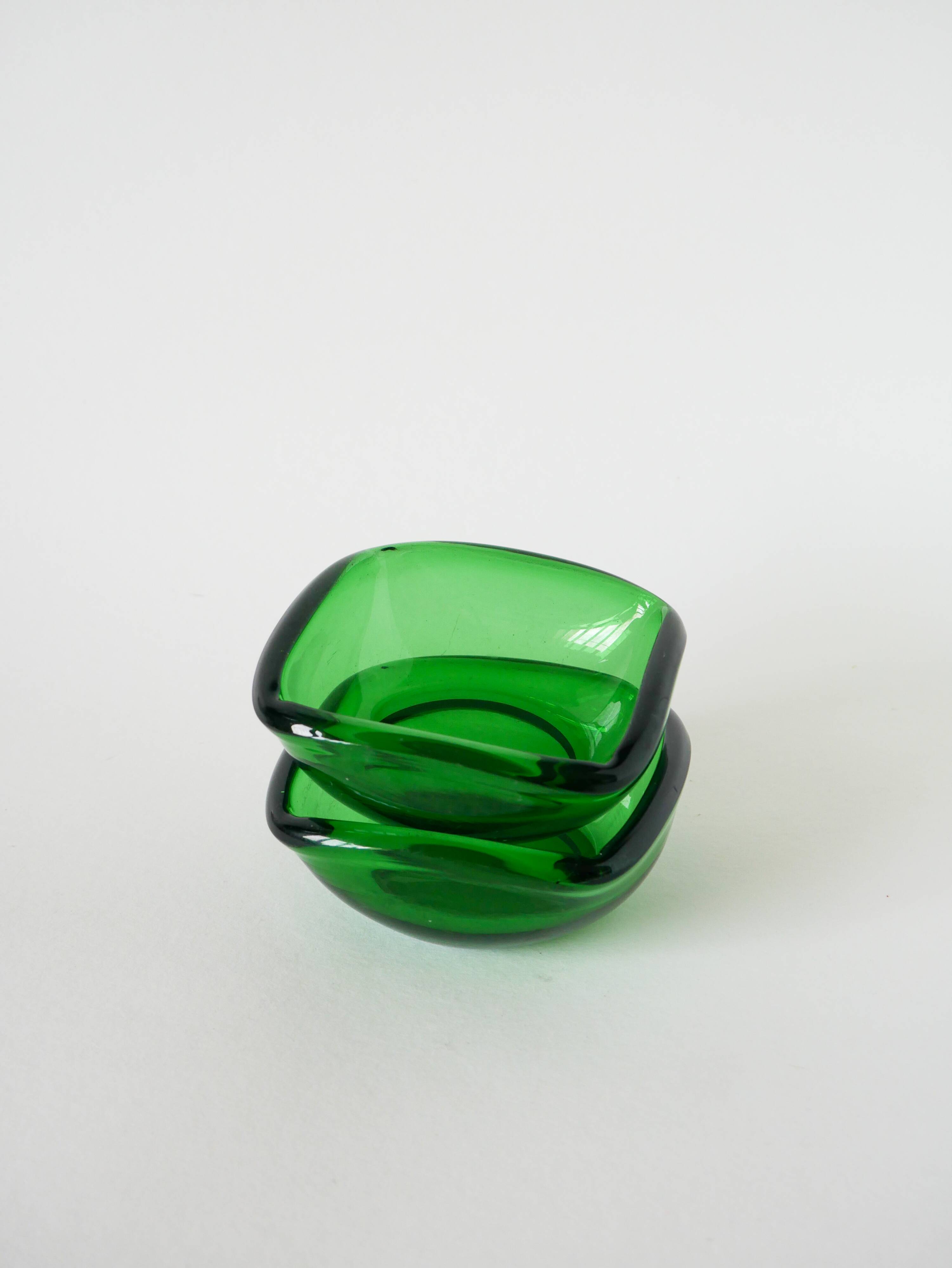 Pair of green colored glass storage compartments, in the Murano style, 1970