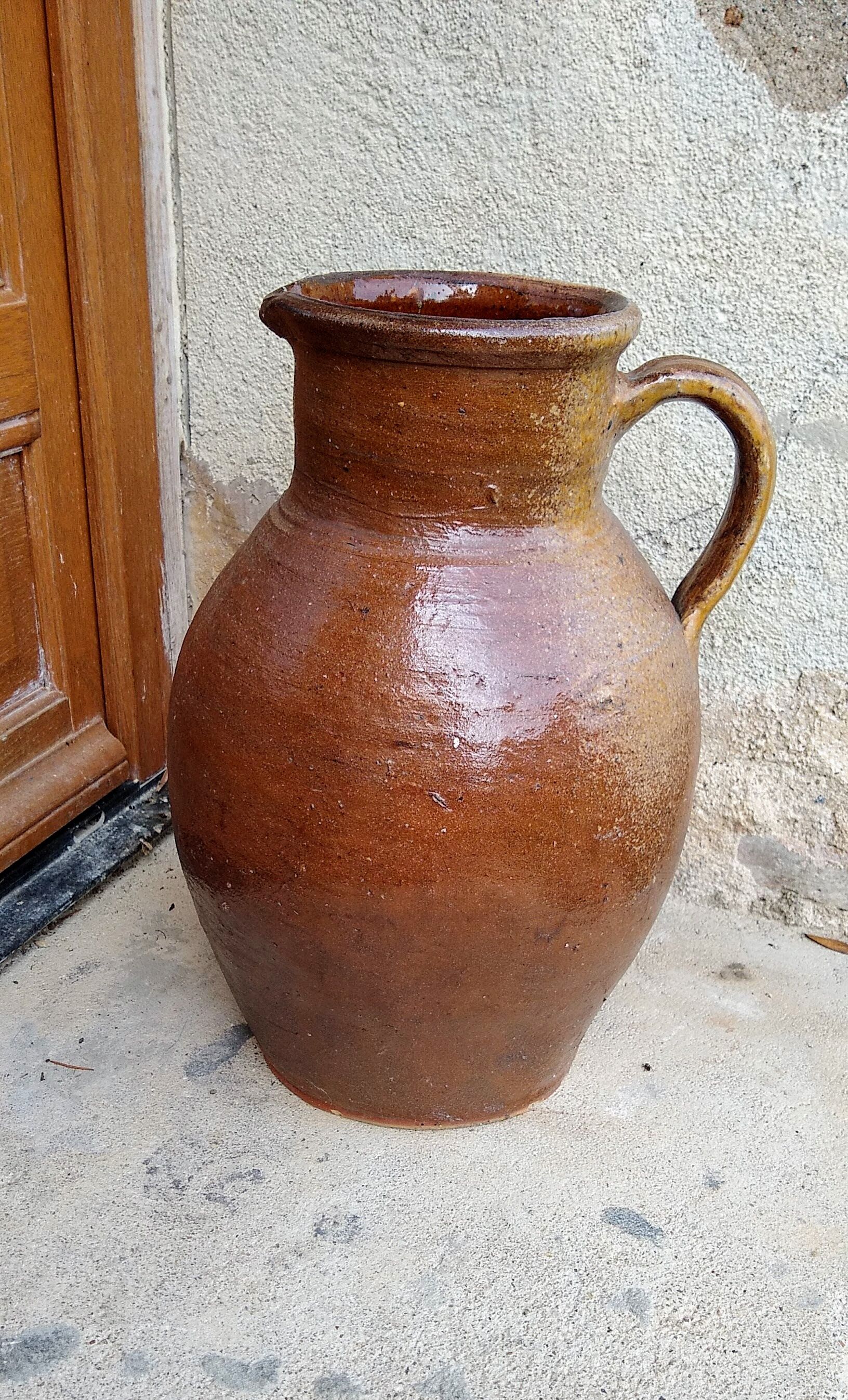 Glazed terracotta jug