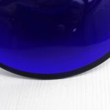 Blue glass saucer candle holder