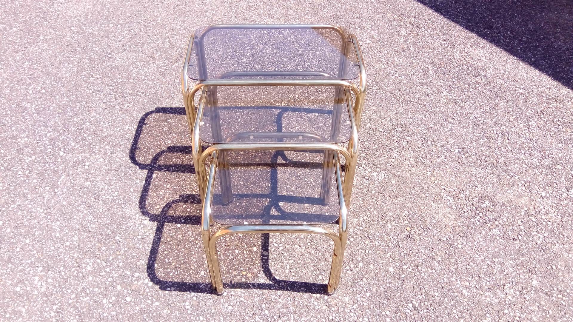 Series 3 pull out tables gold metal and glass