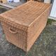 Old braided wicker trunk