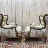Paire de fauteuils bergères de style Louis XVa oreilles