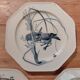 Set of three blue ironstone flat plates.