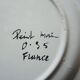 Old ceramic plate, hand-decorated, signed: bird on a fence.