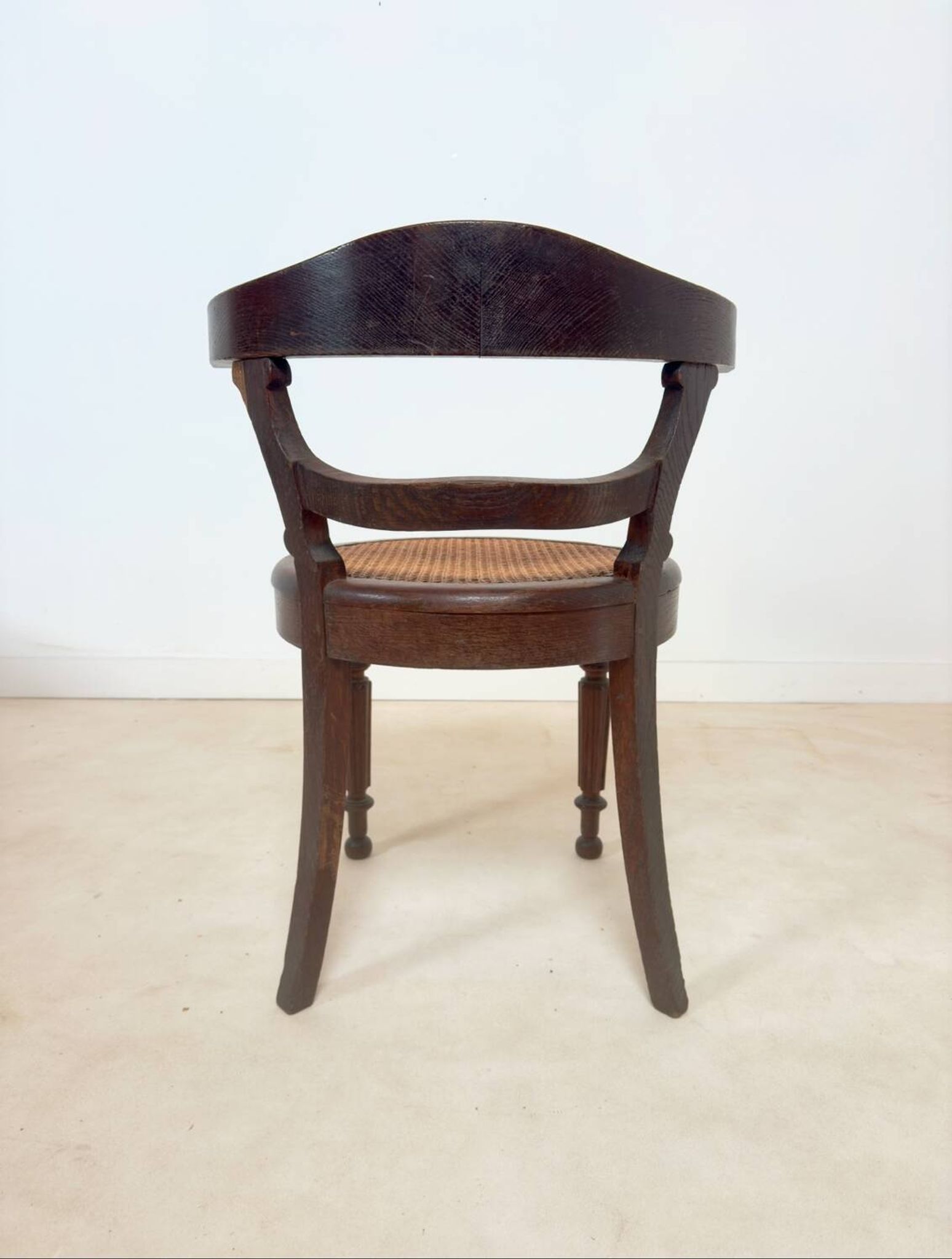 Antique Louis Philippe style chair in wood and caning.