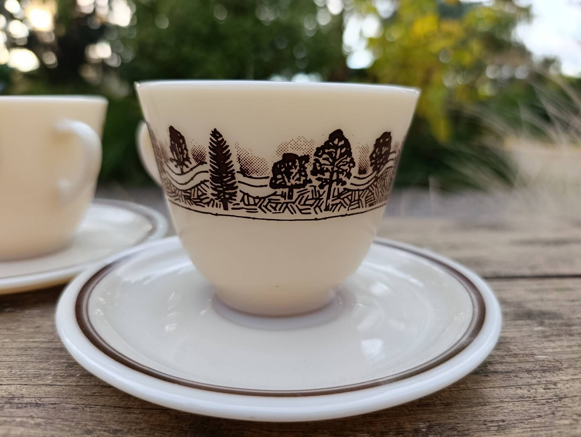 Two vintage opaline glass cups/saucers JAJ Pyrex England.