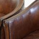 Set of 2 club chairs/armchairs in dark cognac leather