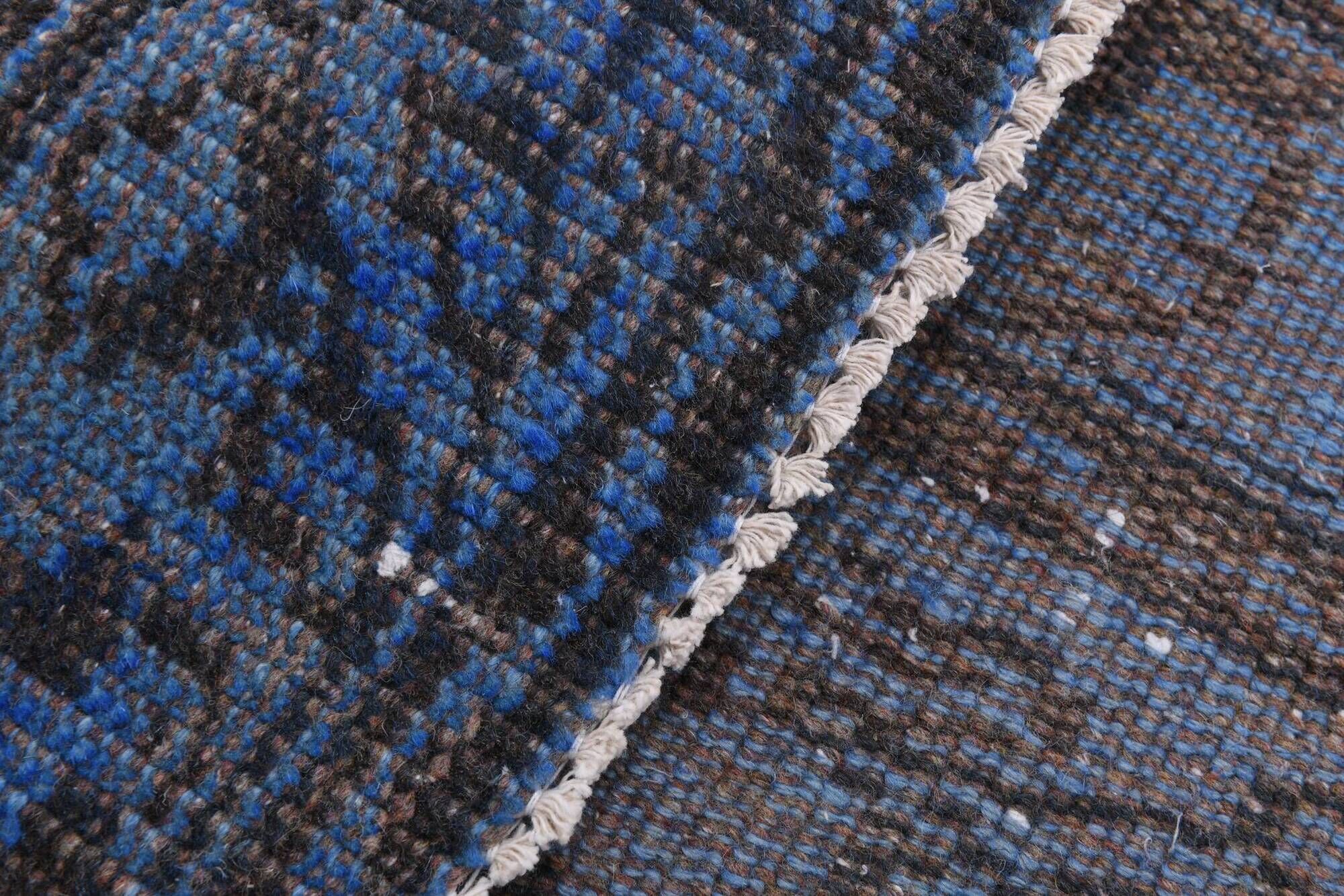 Vintage blue and black Turkish rug with traditional design, 163 × 268 cm