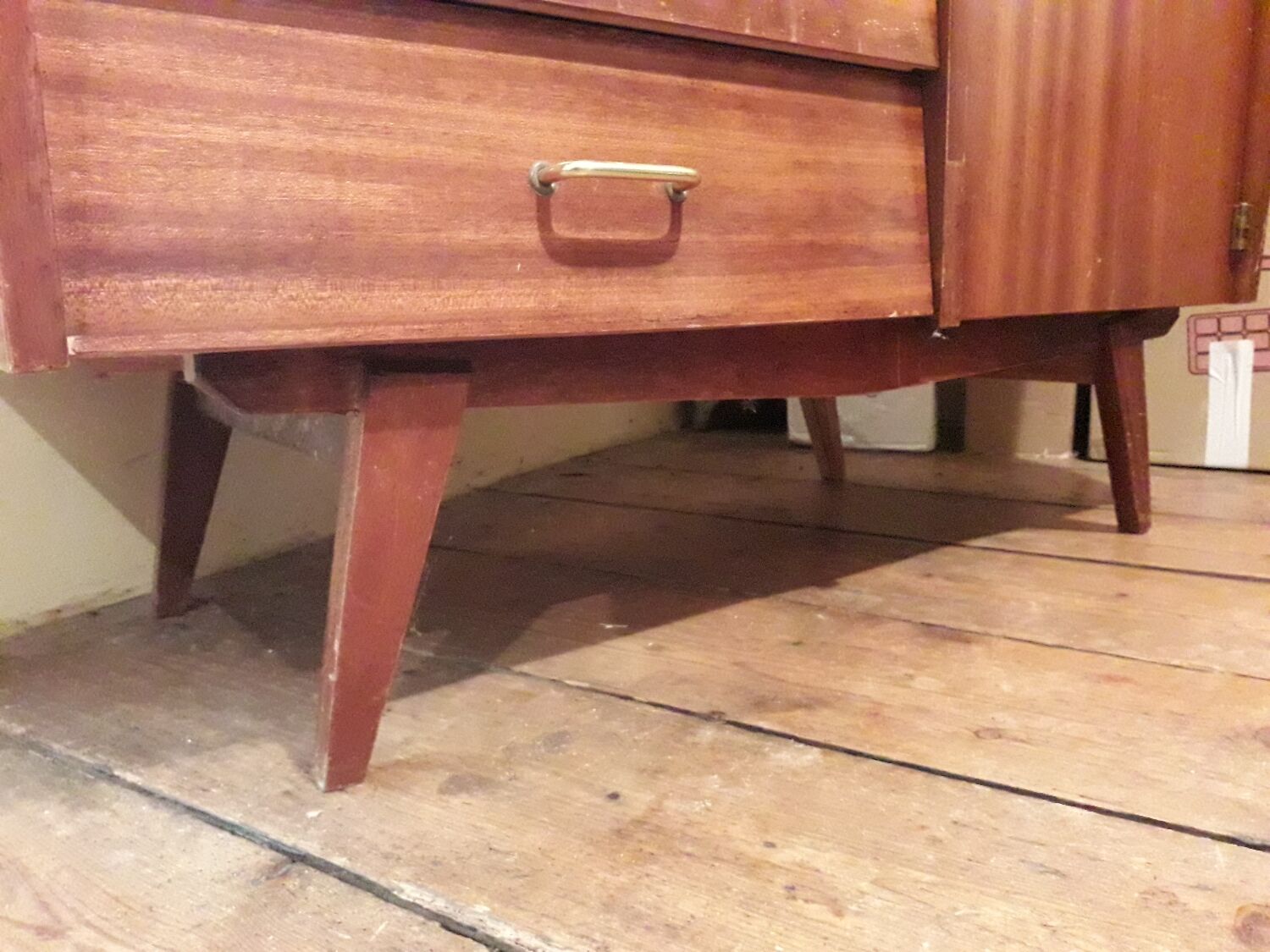 Vintage teak chest of drawers with compass legs
