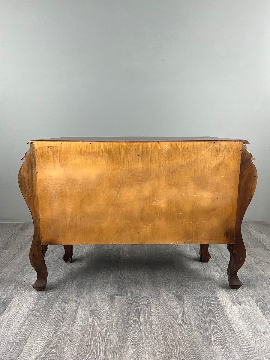 Curved commode in the Louis XV style, carved wood, 19th century.