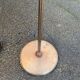 Vintage articulated floor lamp in gilded bronze and solid wood 1950.