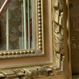Gilded wood fireplace mirror with pediment, height 142