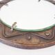Decorative mirror in wood and gold metal
