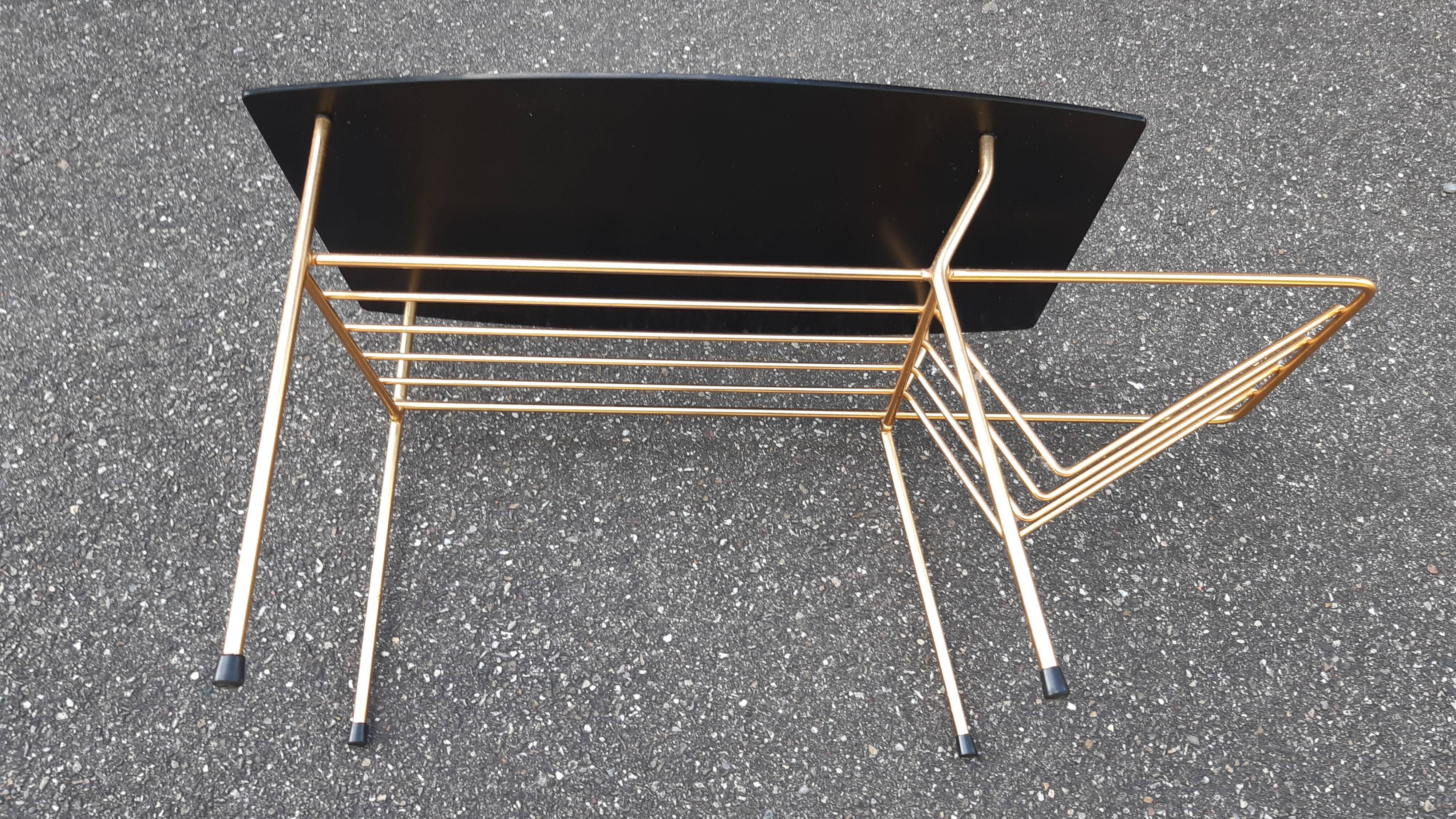 End of sofa black glass and brass 1970