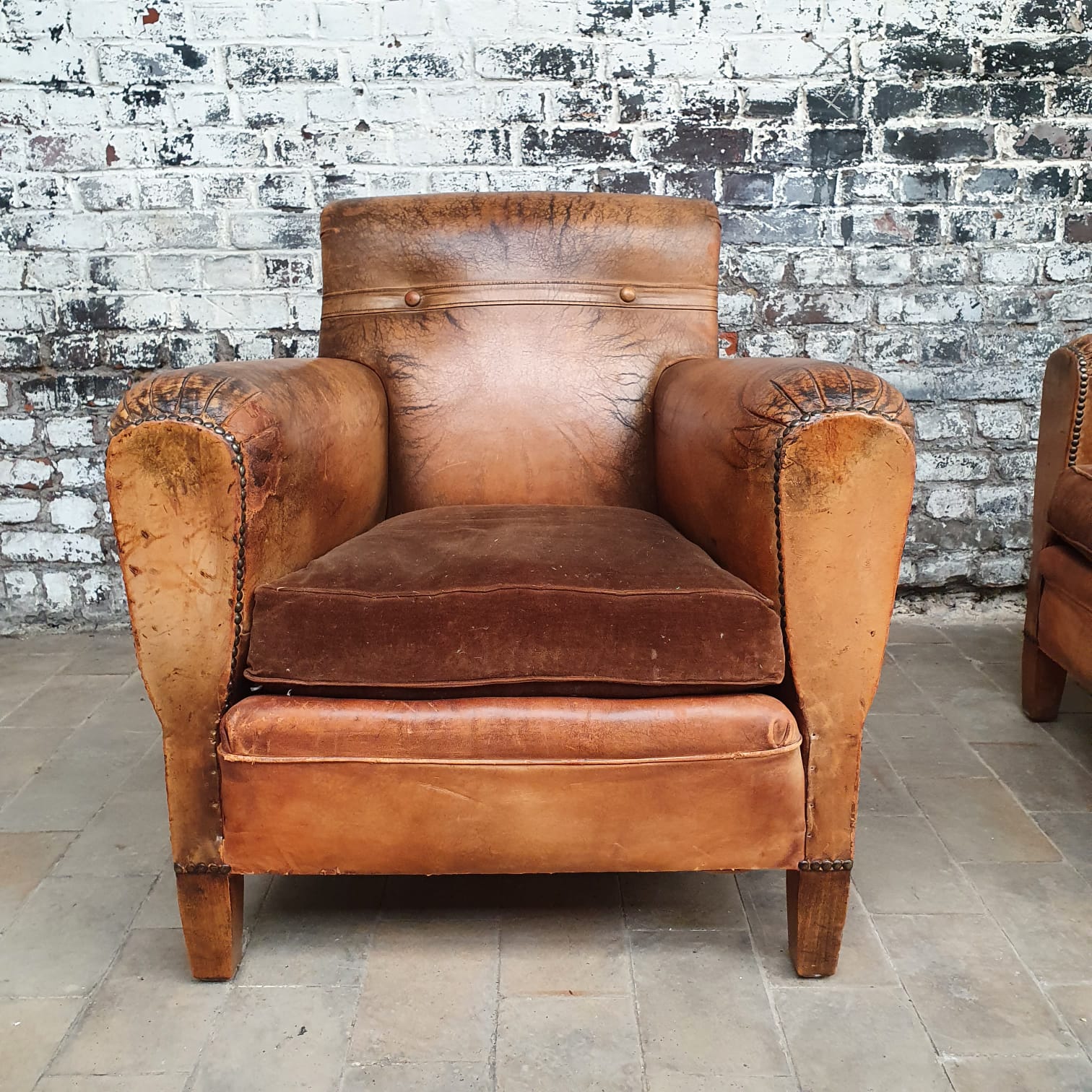 Pair of leather club chairs
