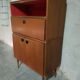 Teak bar cabinet and teak veneer, saddle leather and brass handles