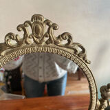 Swivelling brass mirror
