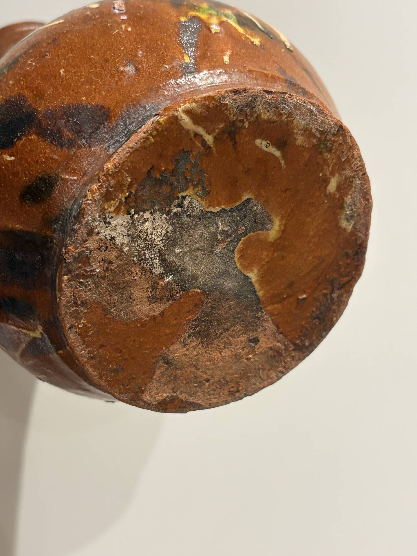 Studio ceramic pitcher with sprayed glazes – circa 1960-70