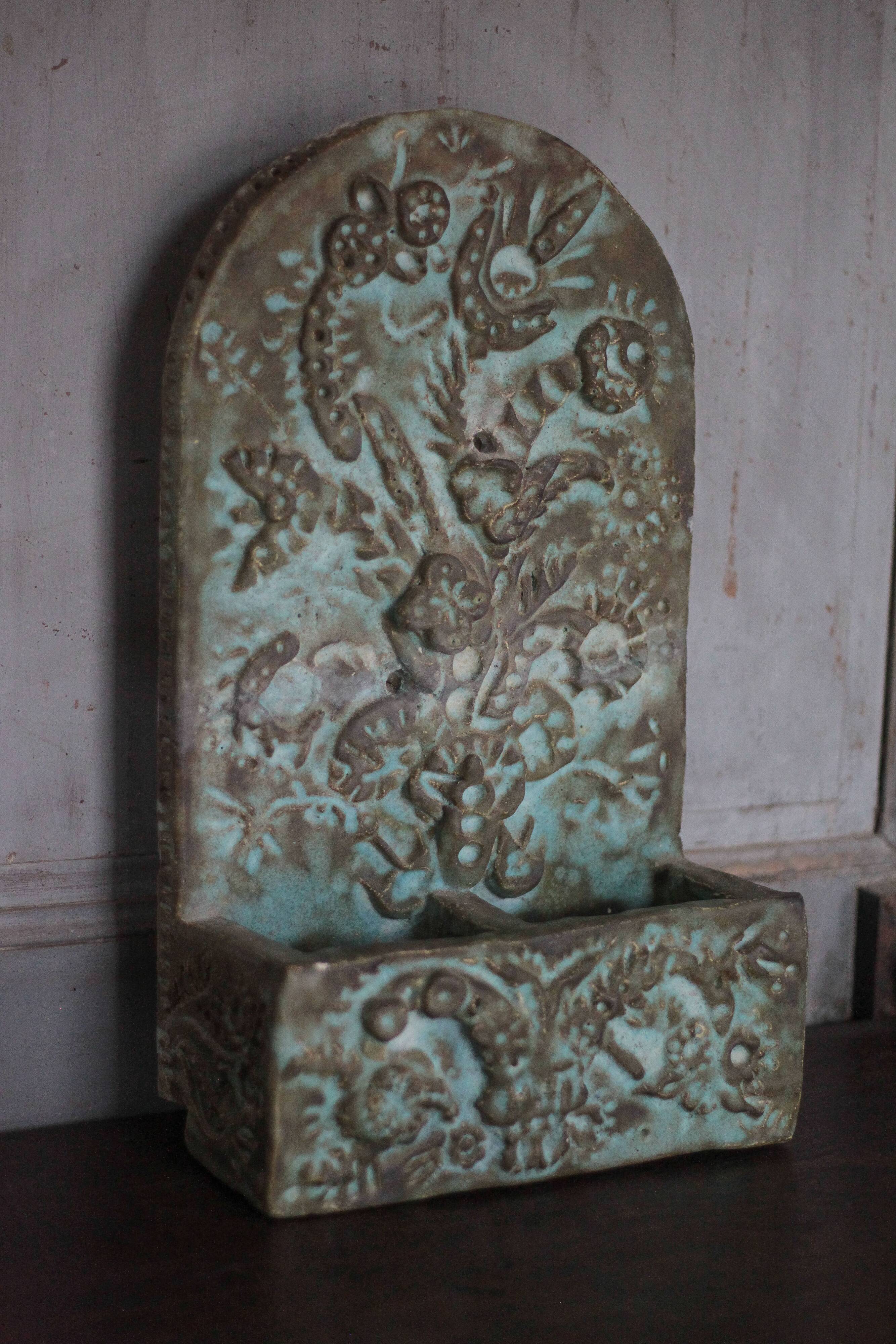 Pair of signed ceramic wall planters, pot cover