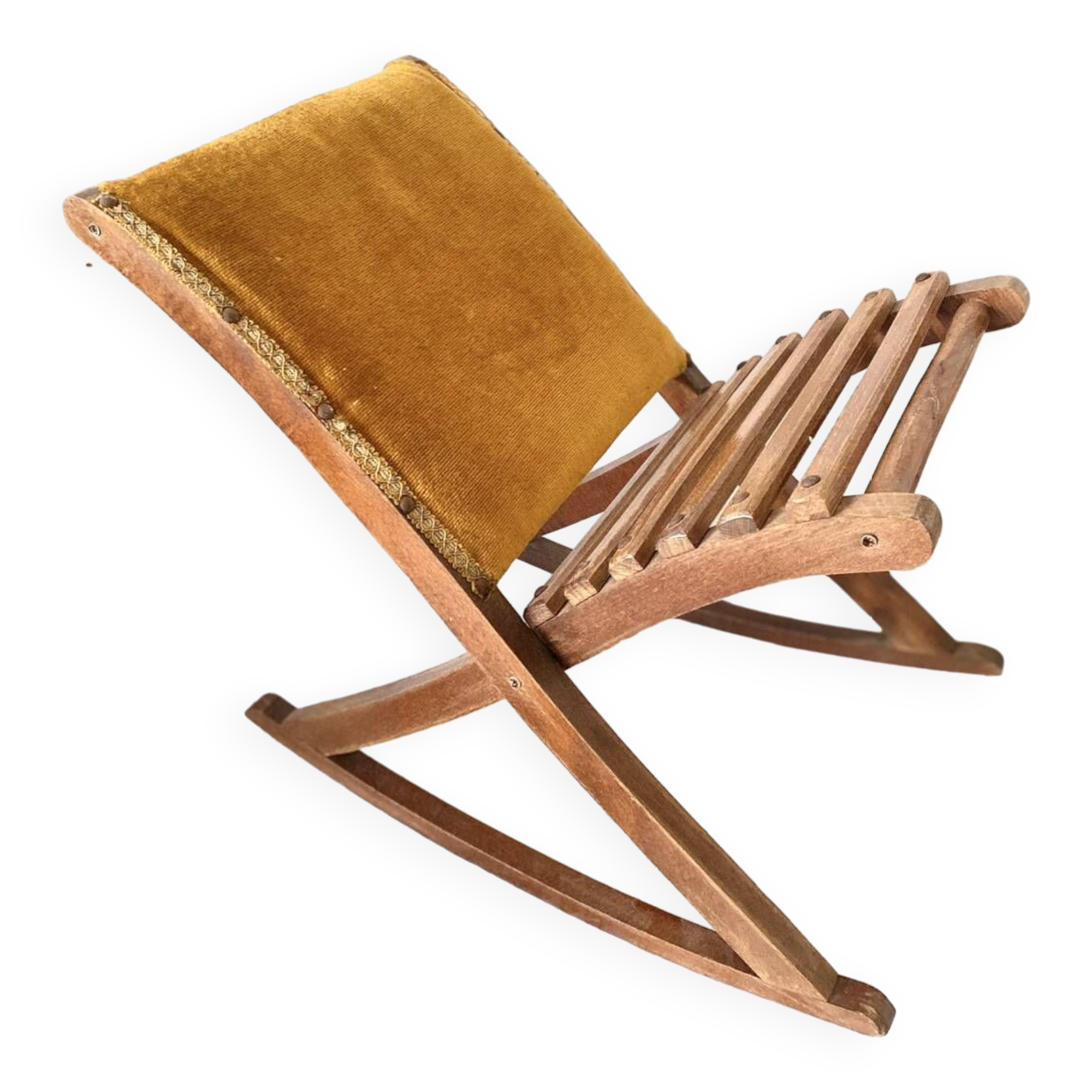 Old wooden rocking footrest with velvet fabric