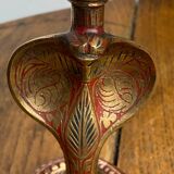 Chiseled brass cobra candlestick