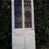 Porte d’entrée ancienne en chêne vitrée grilles en fonte 1925