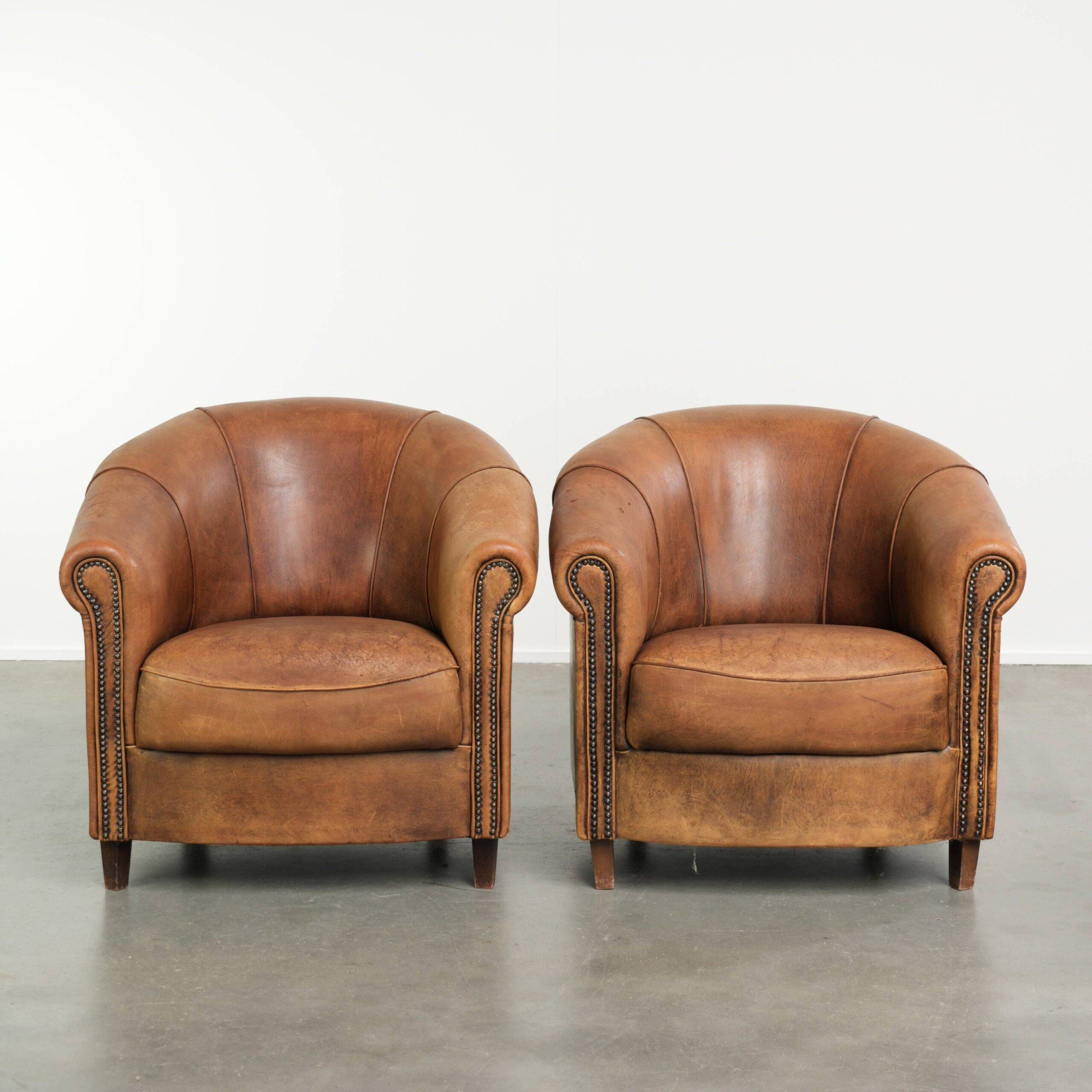 Sturdy set of vintage sheepskin club armchairs with a great appearance