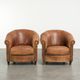 Sturdy set of vintage sheepskin club armchairs with a great appearance