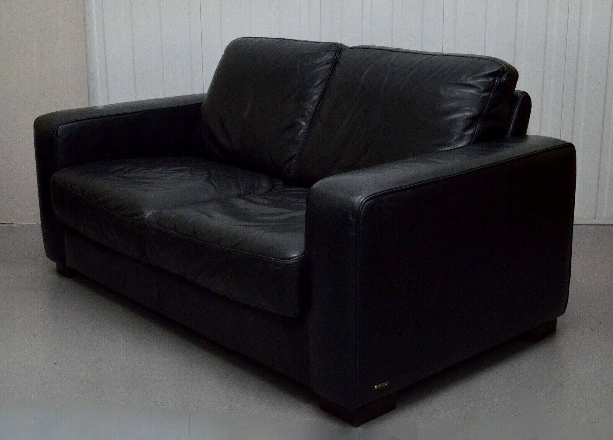 Canapé 2 places en cuir Natuzzi avec fauteuil