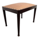 Vintage wooden ottoman from the 1940s with a silk top and studded trim.