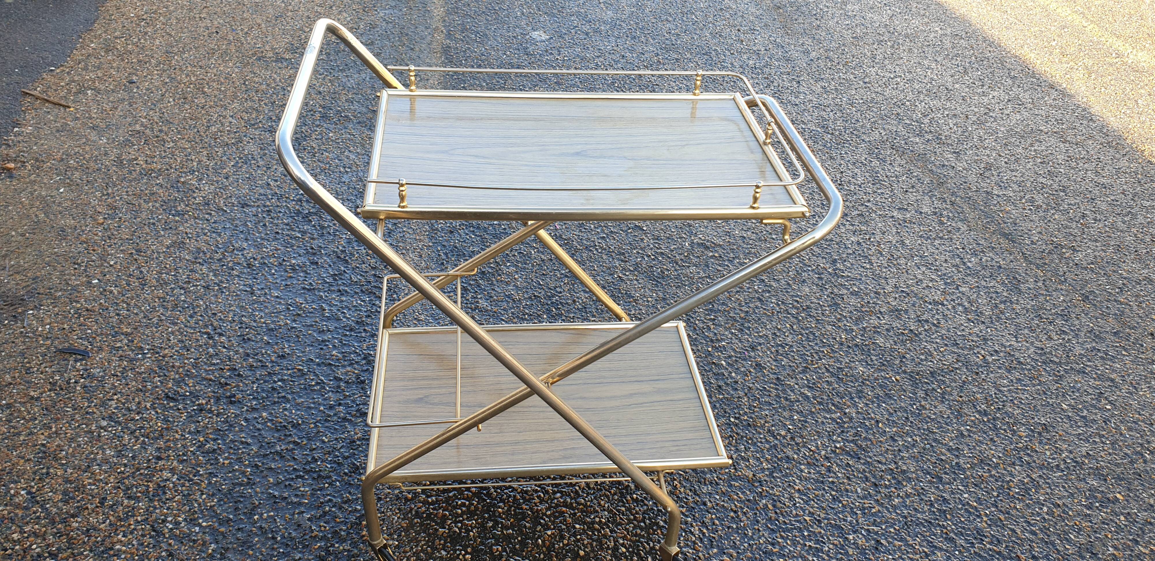Vintage folding serving table on wheels