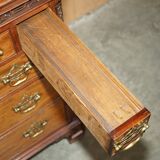 George III commode circa 1770 in walnut by Thomas Chippendale.