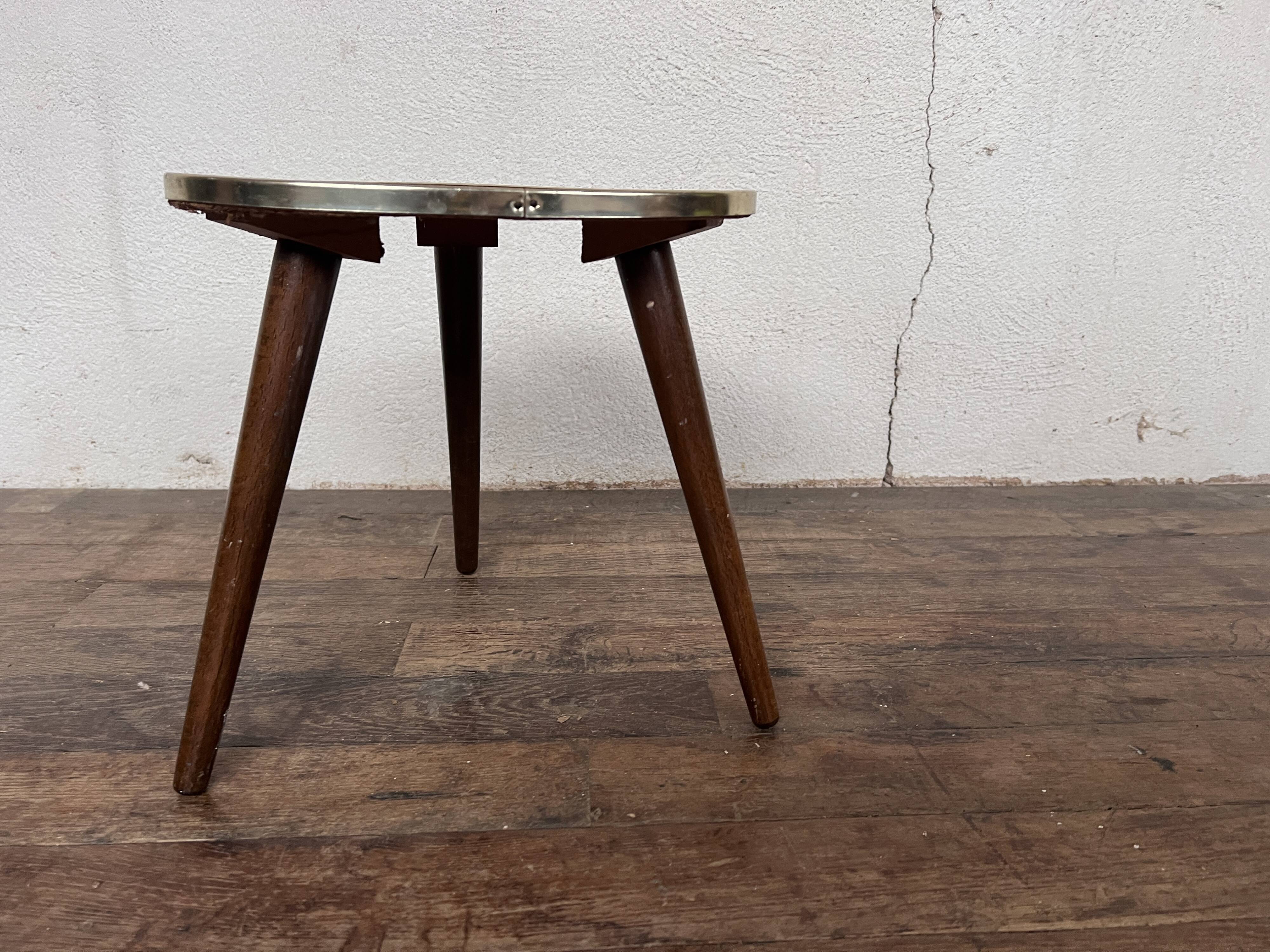 Triangular pedestal table small red table asymmetrical shape vintage tripod plant door