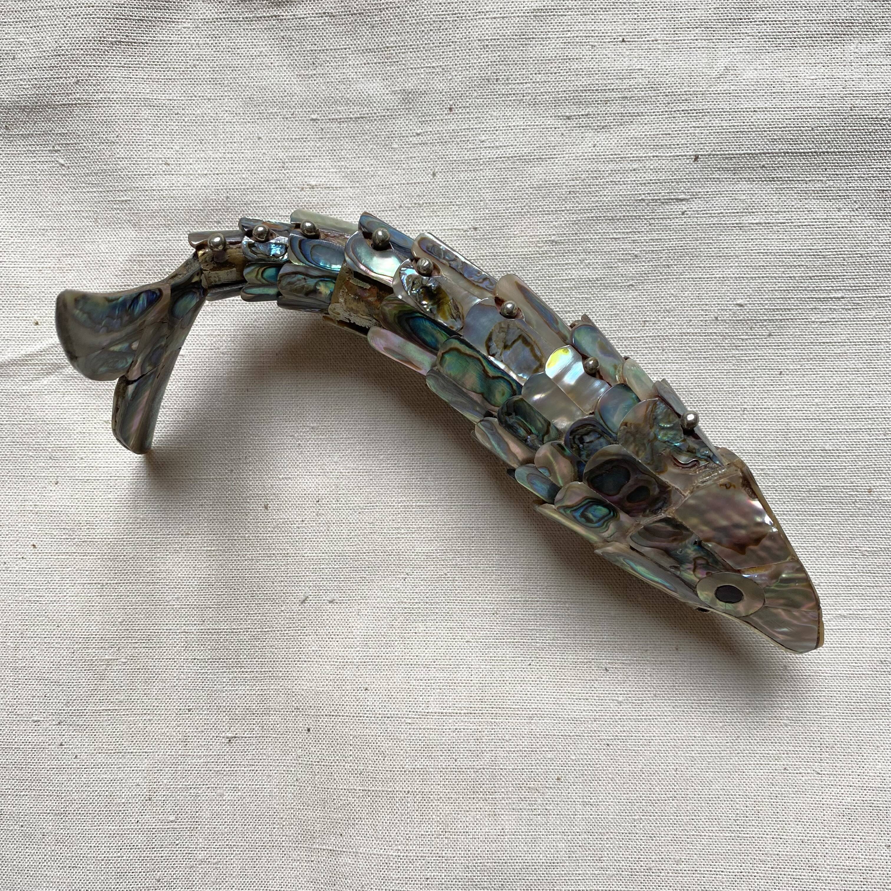 Fish-shaped bottle opener made of seashell and brass, 1970s