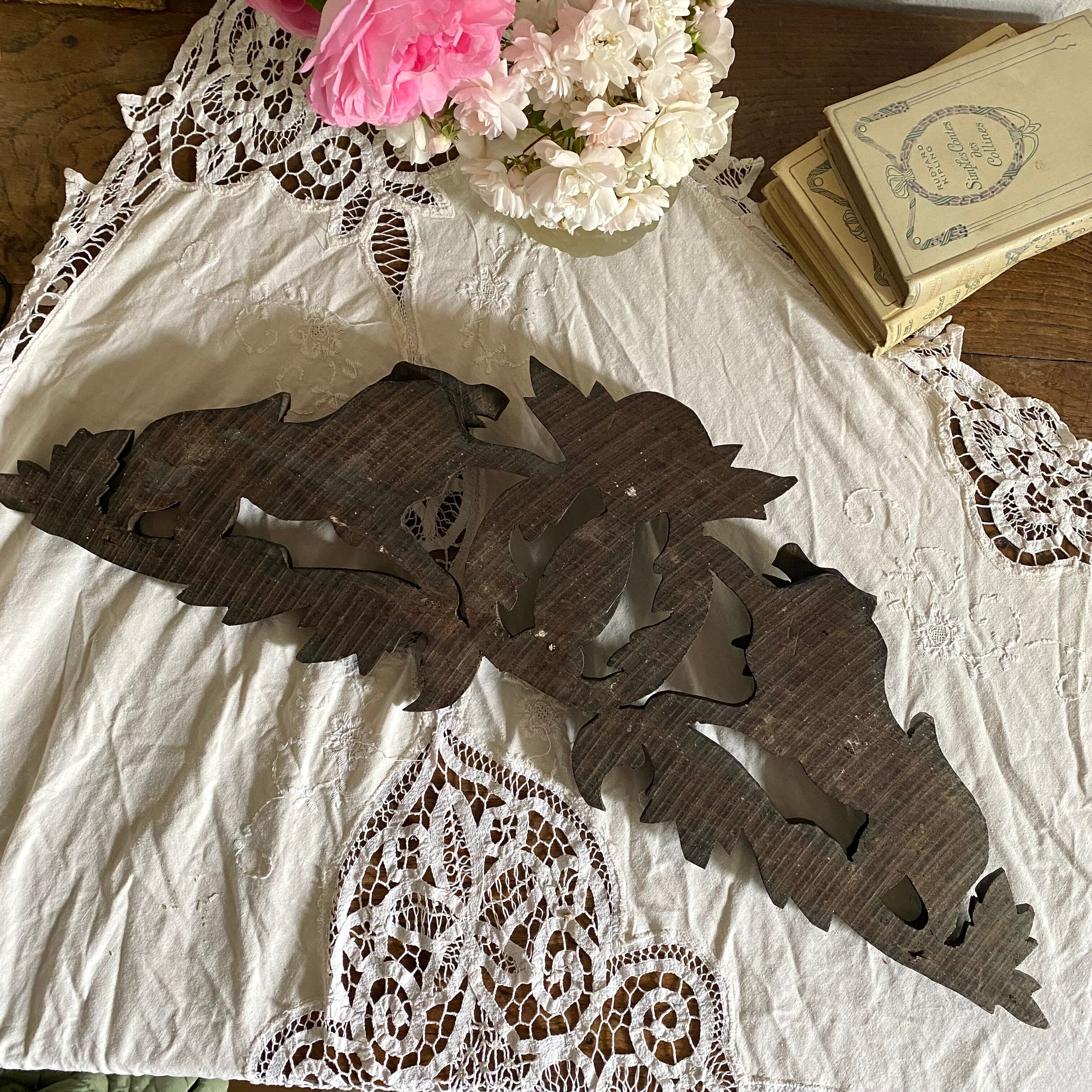 Antique carved wooden pediment with lions and medallion