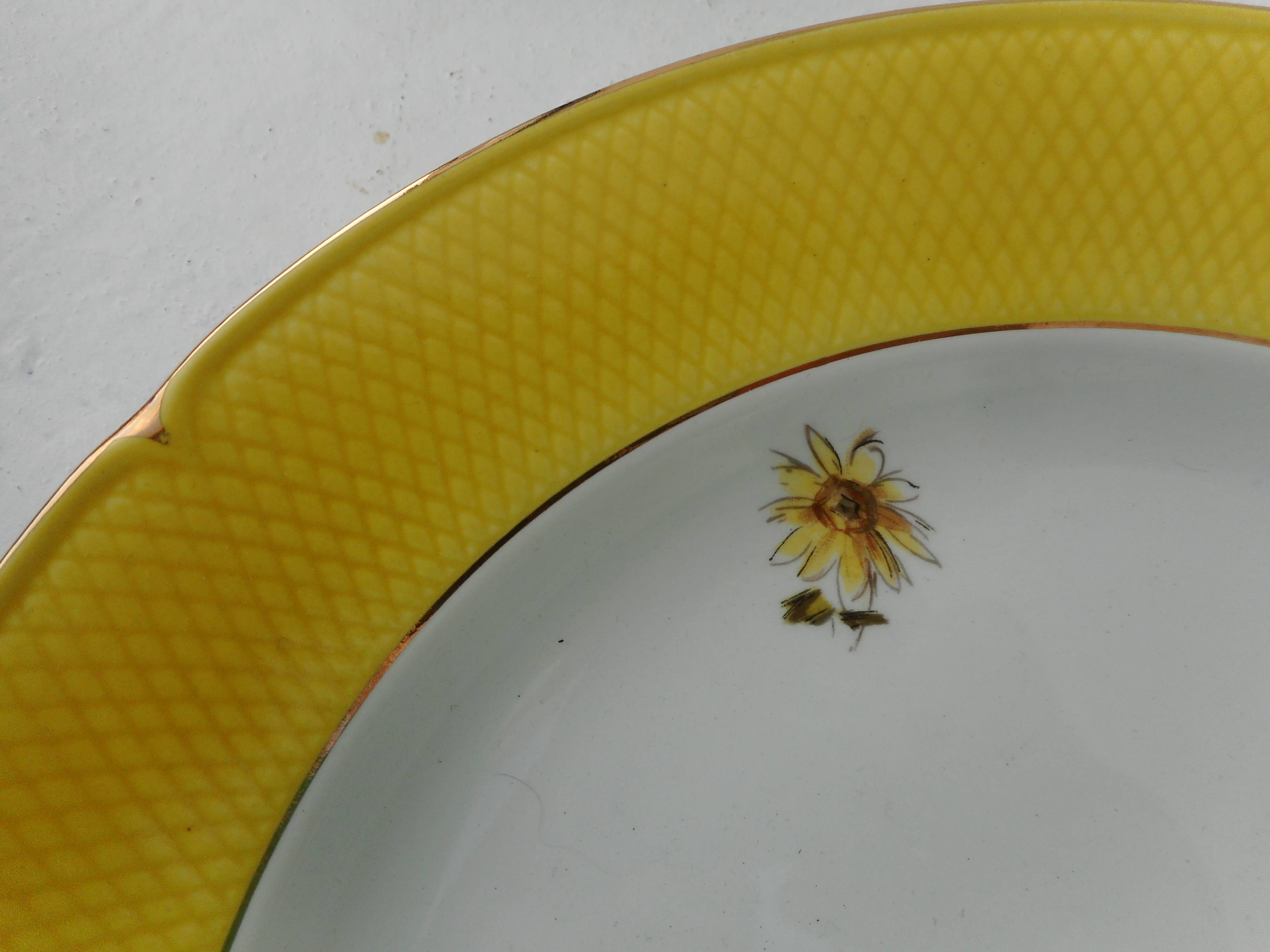 Set of six flat earthenware plates