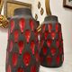 Pair of "drippy" ceramic vases by Tyson LONDON