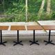 Square bistro table with a wooden central leg Werzalit Bordeaux - France