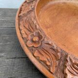 Carved wooden pocket emptier