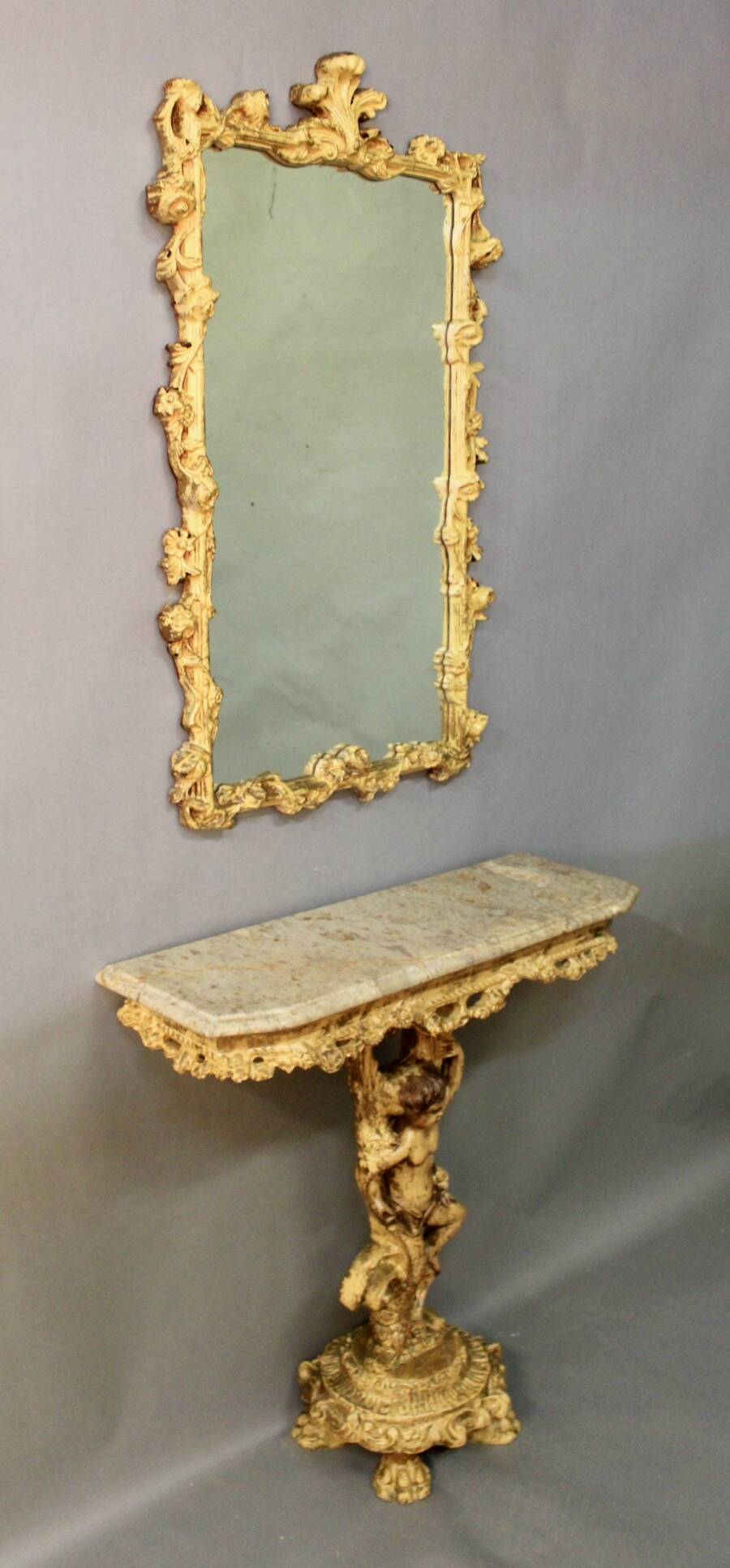 Marble top console and its rocaille style mirror