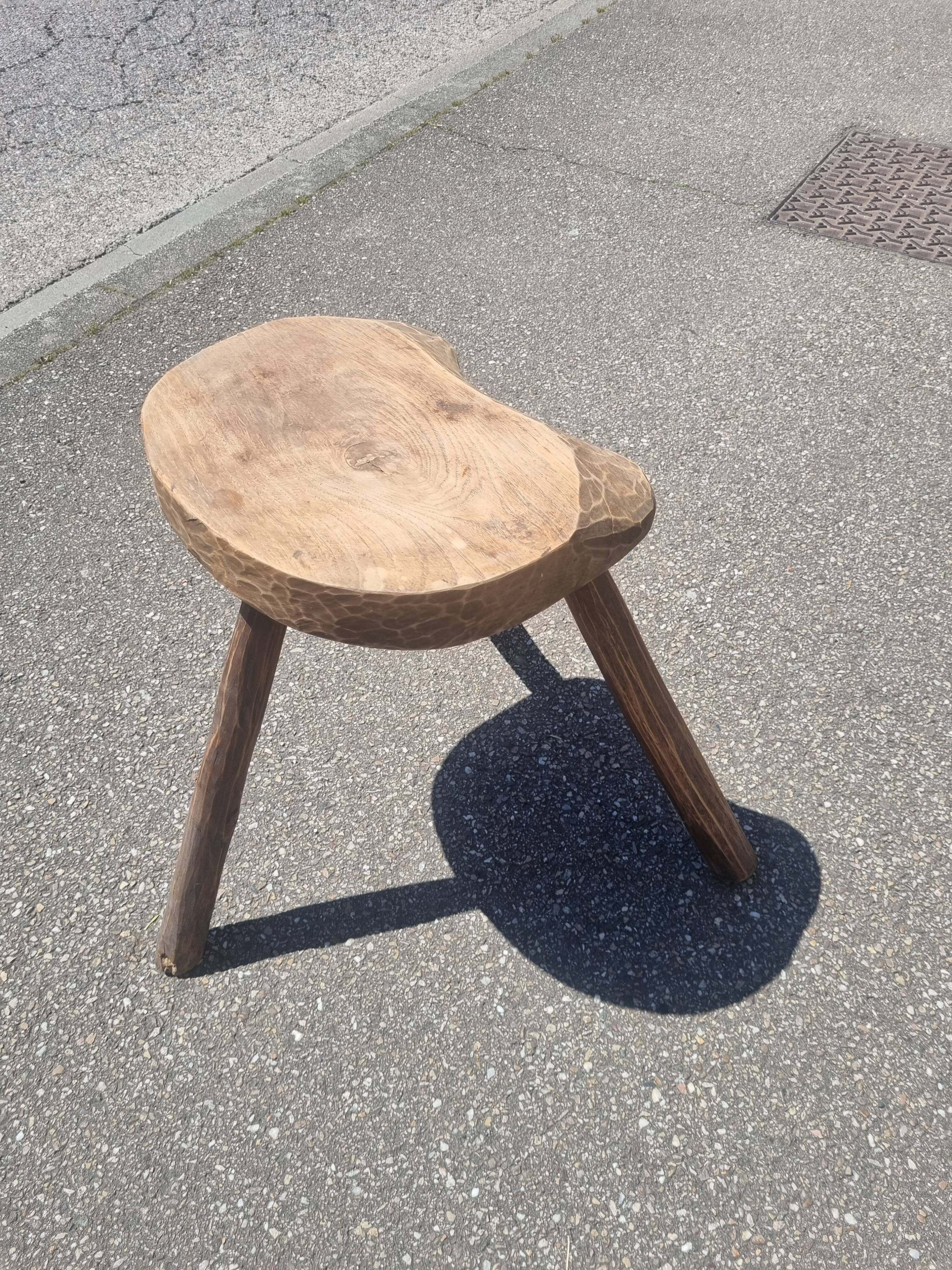 Old wooden tripod stool