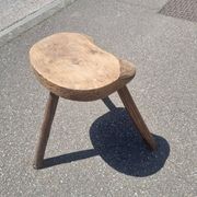 Old wooden tripod stool