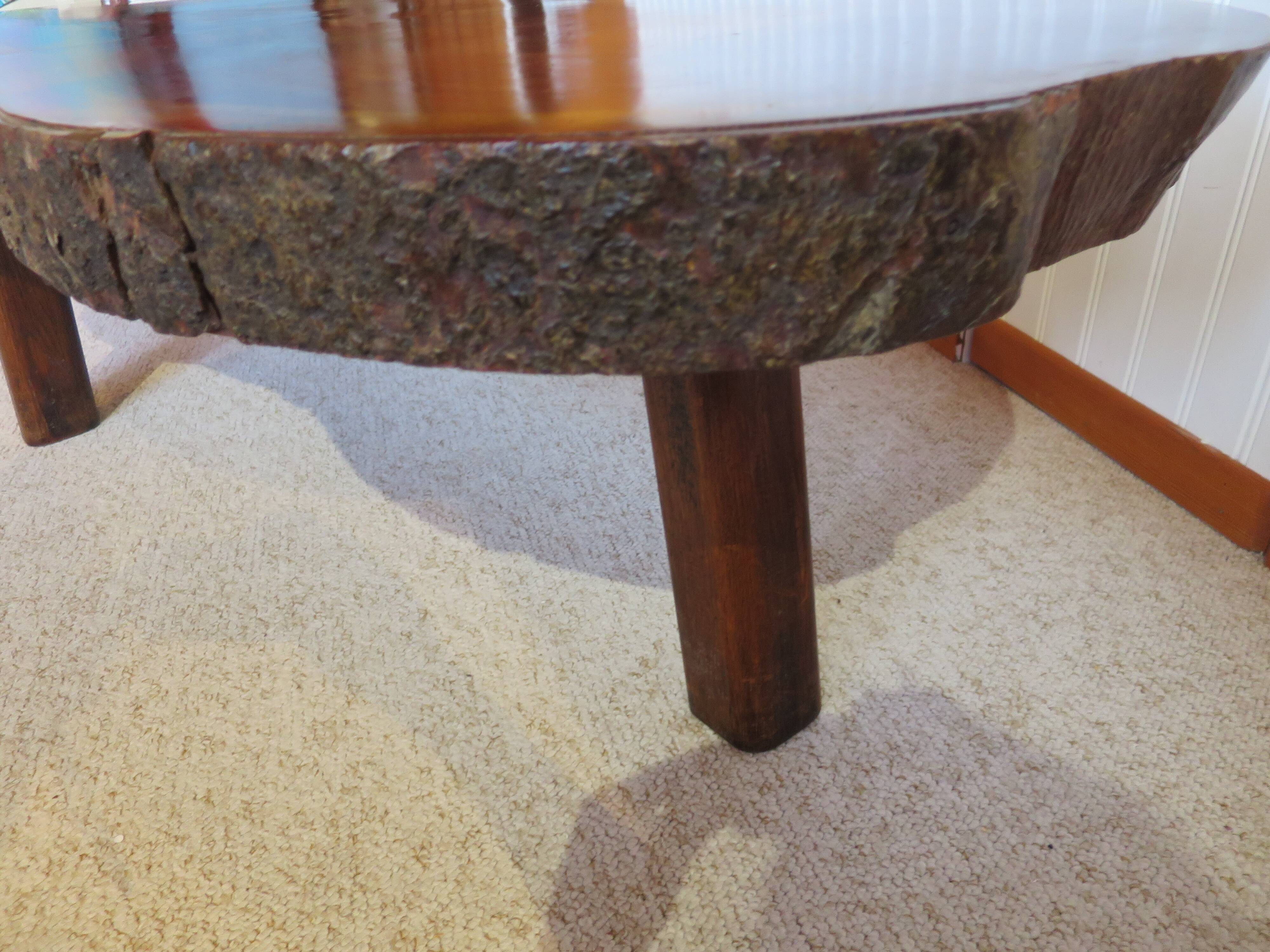 Tripod coffee table - solid okoumé wood - organic shape - brutalist style