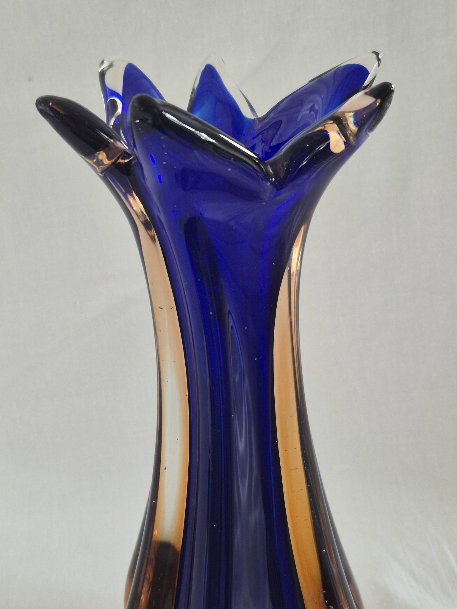 Vintage cobalt blue and amber blown glass vase in Murano style.